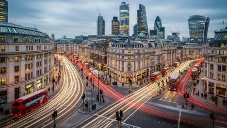 dynamic night cityscape of london with traffic light trails