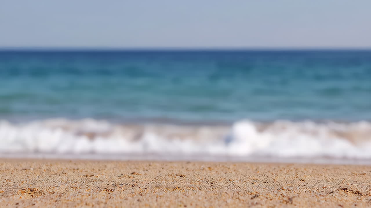 Blurred Beach and Ocean Seascape with Sand and Waves