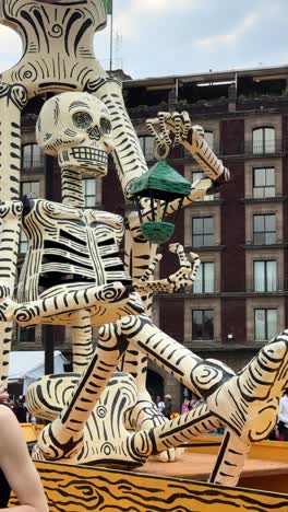 giant catrina skeleton sculpture at day of the dead parade in mexico city