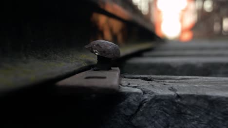 protruding bolt of an old and rusty train line