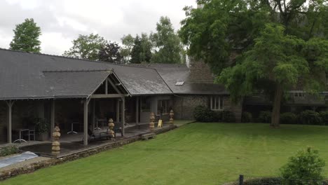 exterior view of a charming country house with a patio