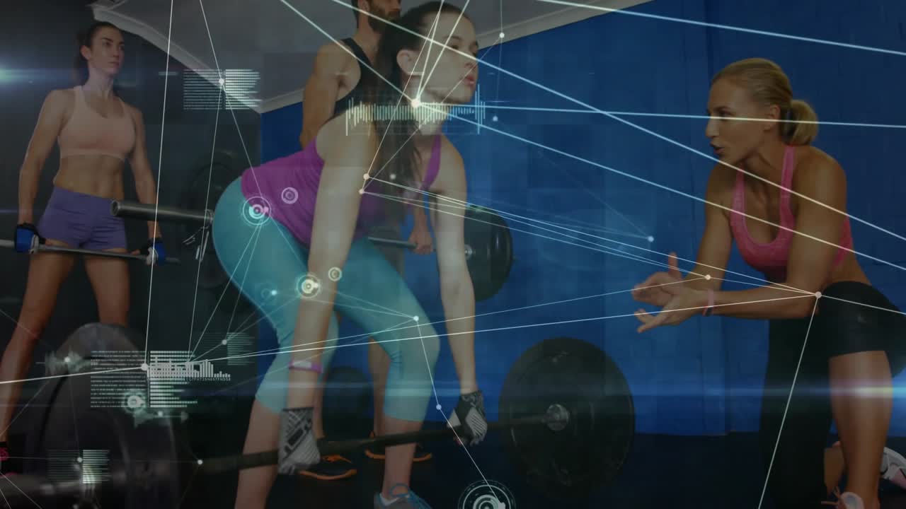 Trainee gripping barbell and initiating live data overlay as coach correcting form during deadlift