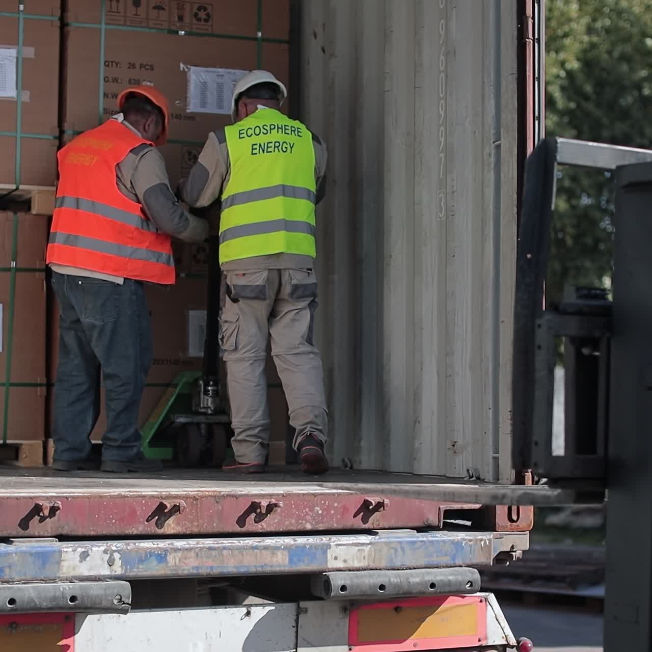 Uploading boxes from the truck. Transportation logistic goods