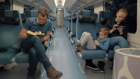 parents with son traveling by express train