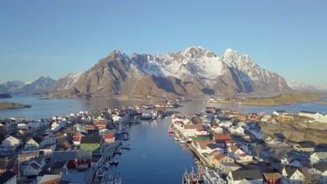 aerial footage of henningsvaer fishing village in winter, lofoten islands, norway, scandinavia