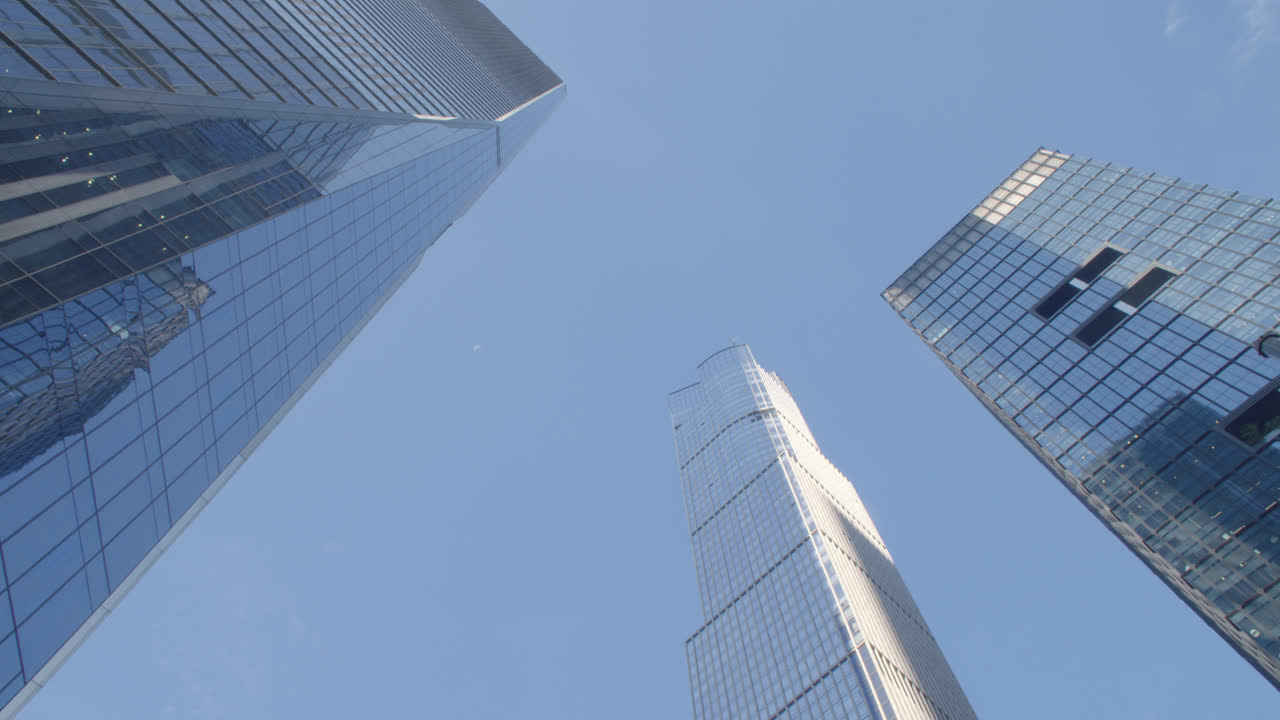 New York City skyscrapers against a blue sky