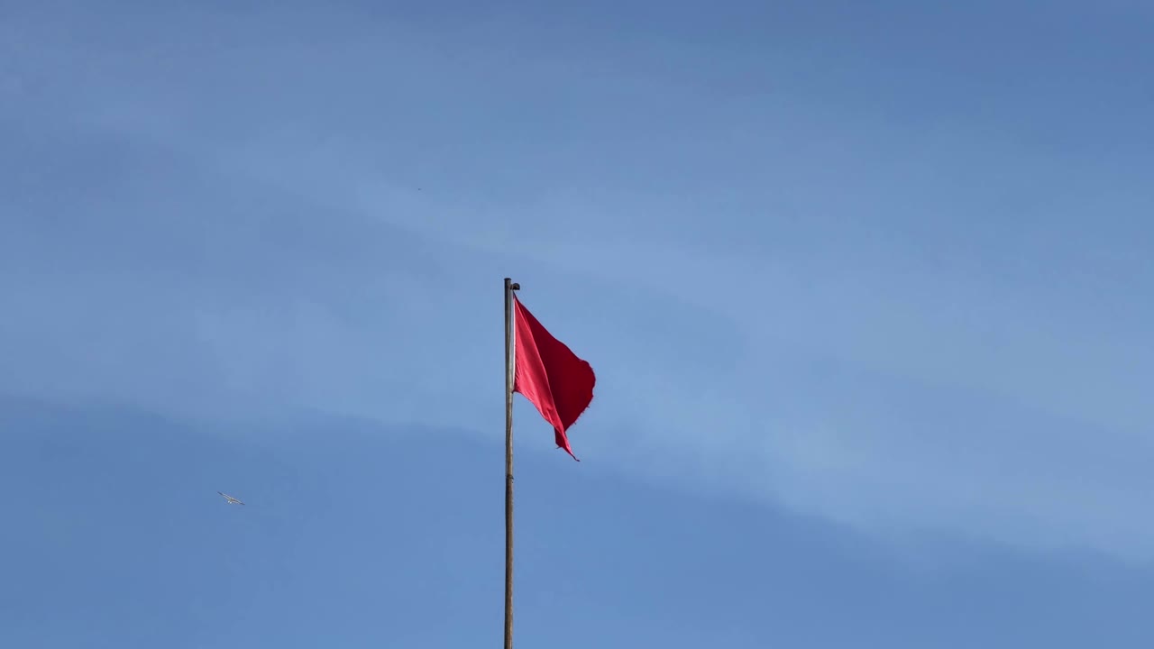 Morocco flag, clear blue background waving with wind, red with a star