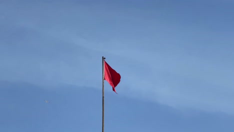 morocco flag, clear blue background waving with wind, red with a star