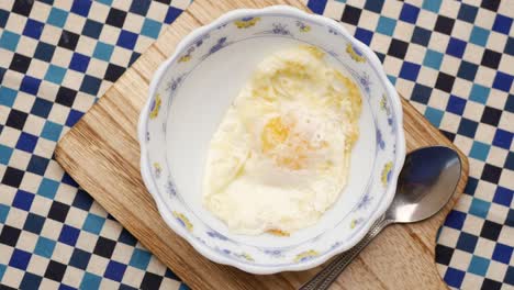 fried egg in a bowl