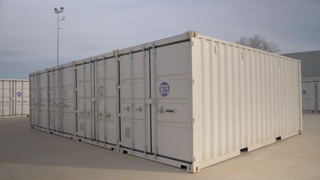 rotating shot around a bright white shipping container