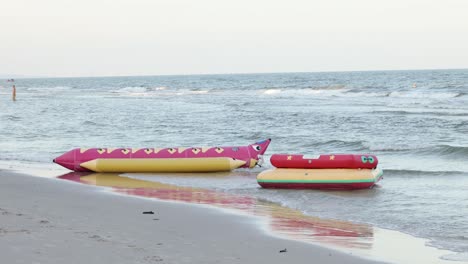 inflatable boat gradually moves into the sea