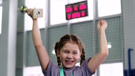 little girl celebrating victory