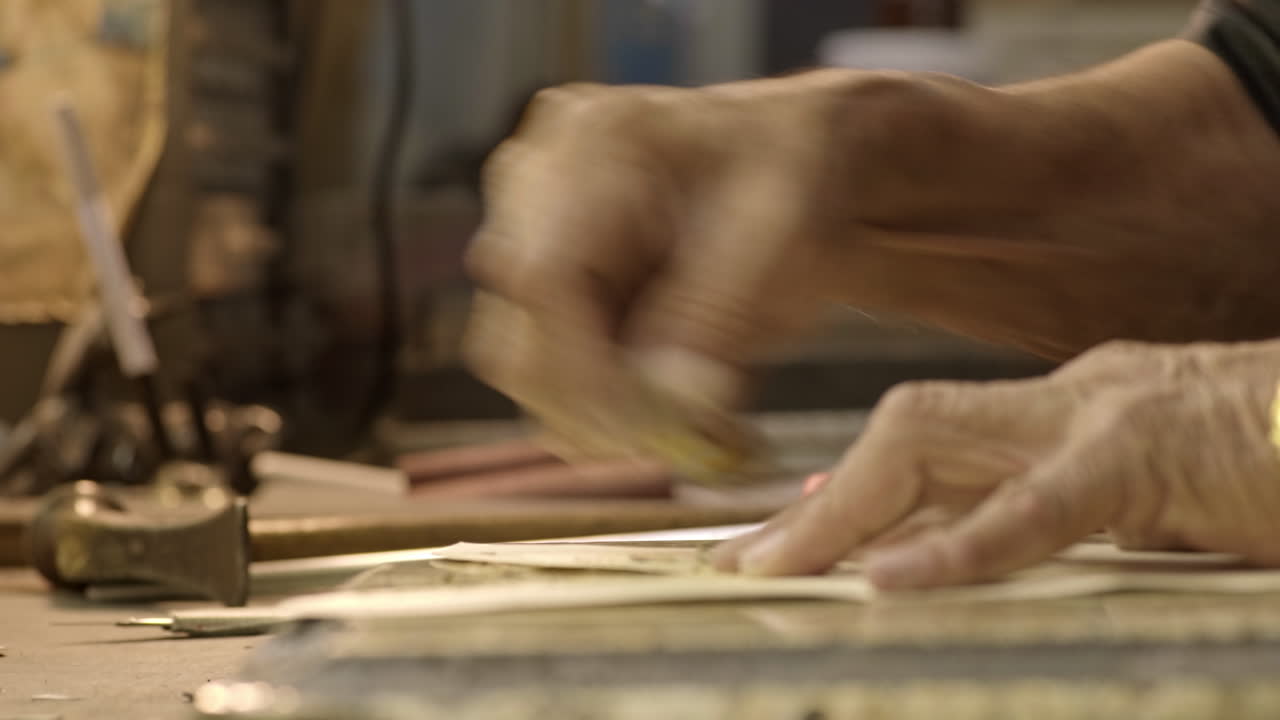 Crafting Legacy: An Old Man's Expertise in Leather Bootmaking