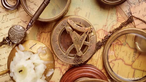 Vintage-style-travel-and-adventure.-Vintage-old-compass-and-other-vintage-items-on-the-table.