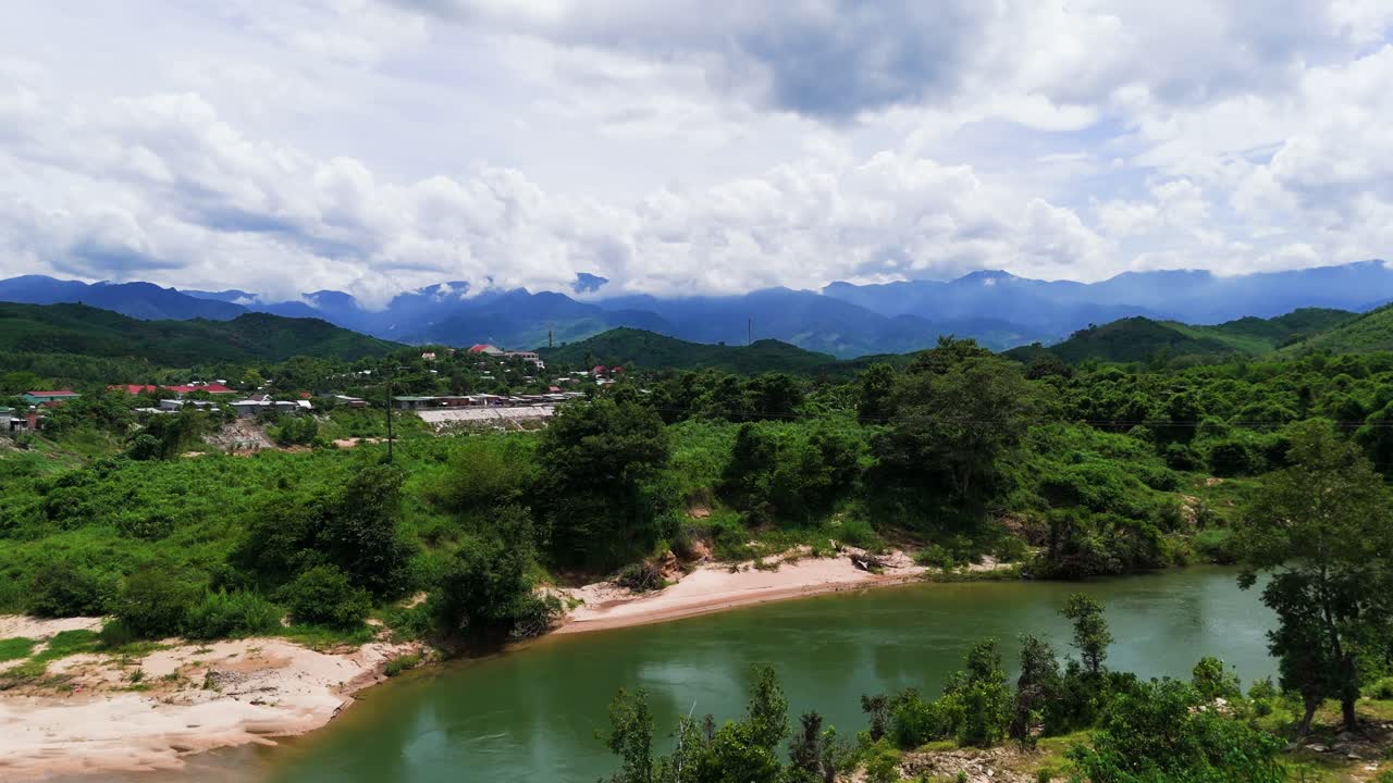 Aerial View Dolly of the River Near the Forest in Lam Dong