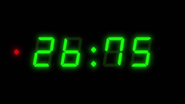 A four number, 30 second digital clock counting down. Green integers on a black background with a red flashing dot. Retro digital alarm clock with glow