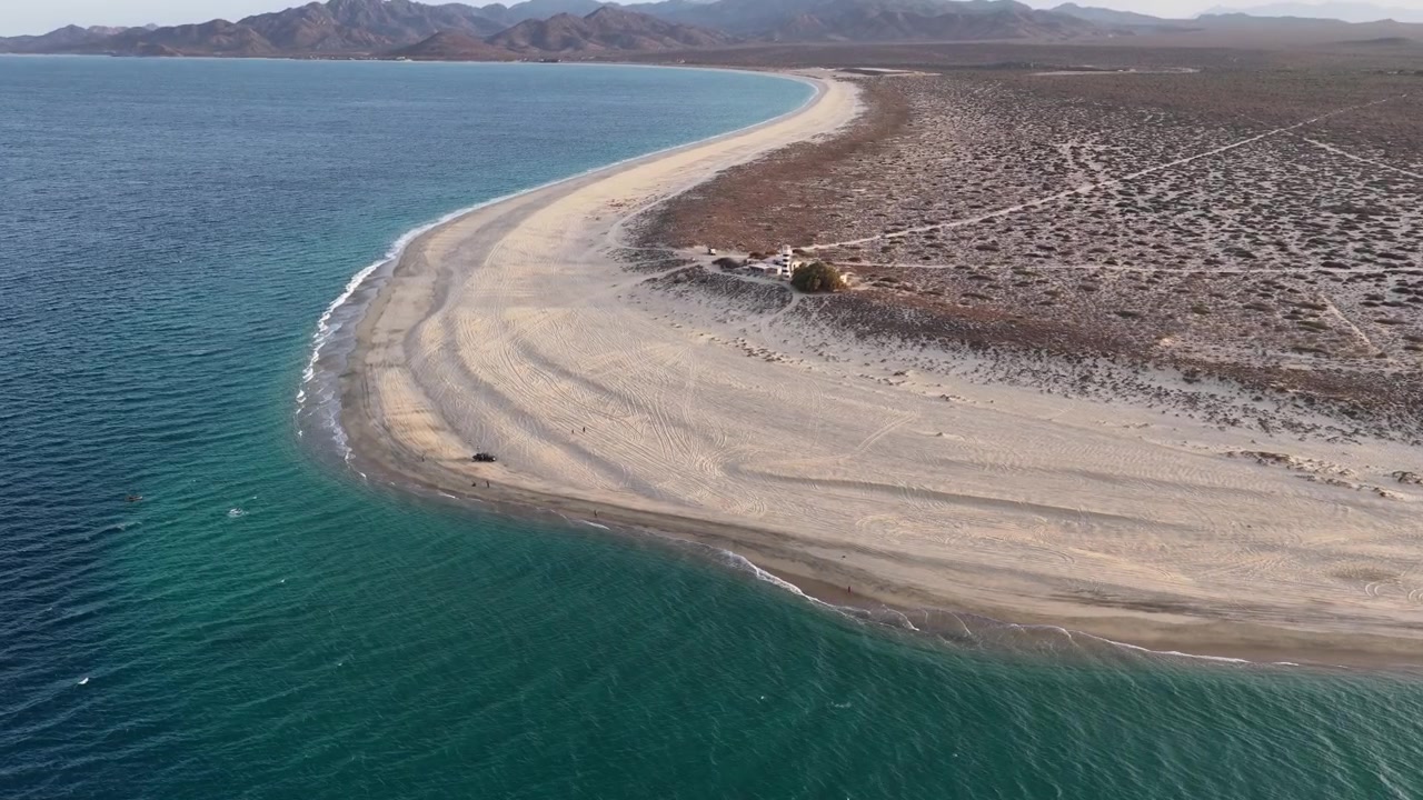 Aerial view of the Punta Arena lighthouse on the sandy beach in Baja California Sur.