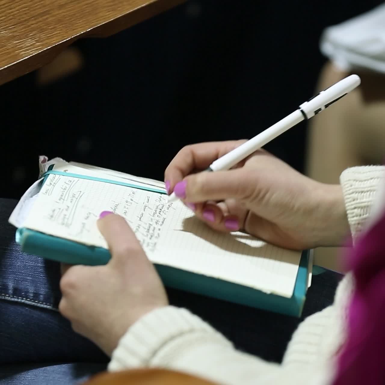 Female Hand Over Paper Notes