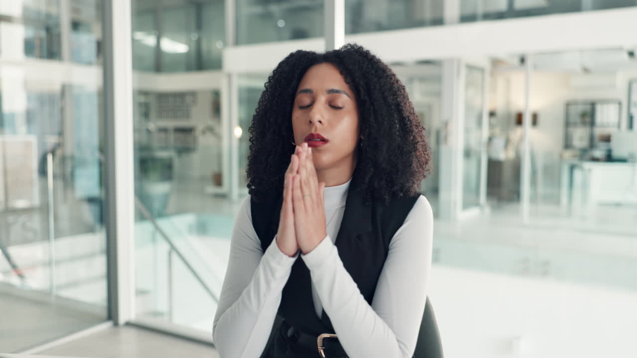 Businesswoman experiencing sadness and stress in the office
