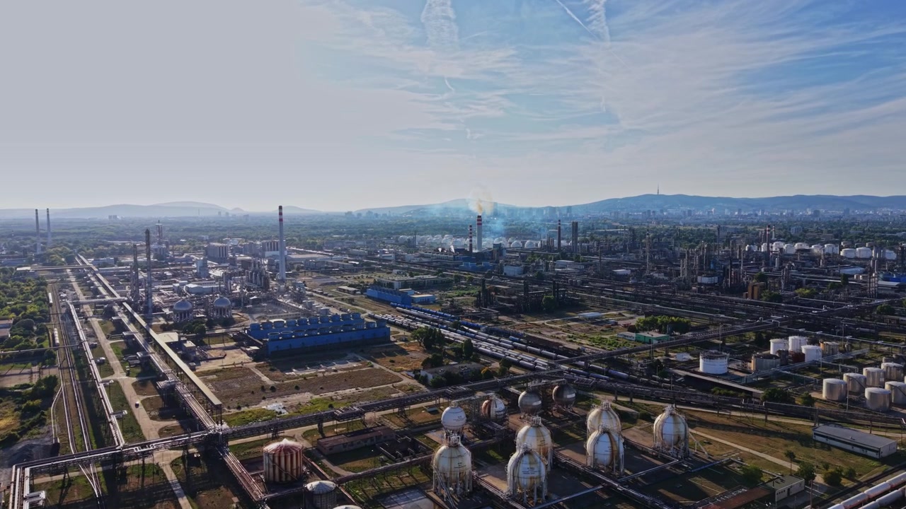 Gasoline production site with pipelines and storage tanks in the industry