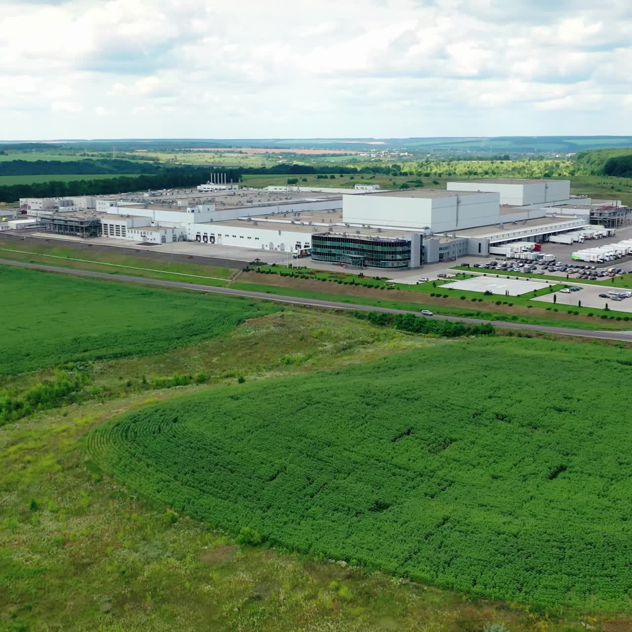 Modern Factory Exterior. Aerial footage of a large industrial complex