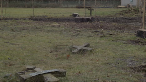 broken crucifixes lying on the ground