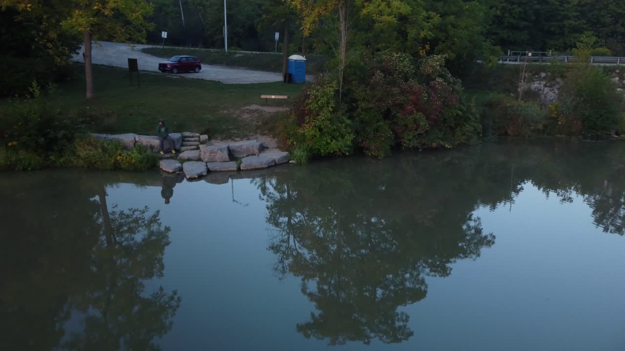 Tourism Promo: Dawn Over Scenic Ontario Lake and Forest