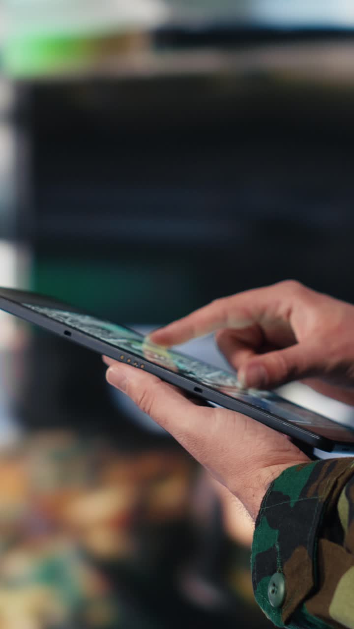 Vertical Video Defense forces officer reviews surveillance and digital systems