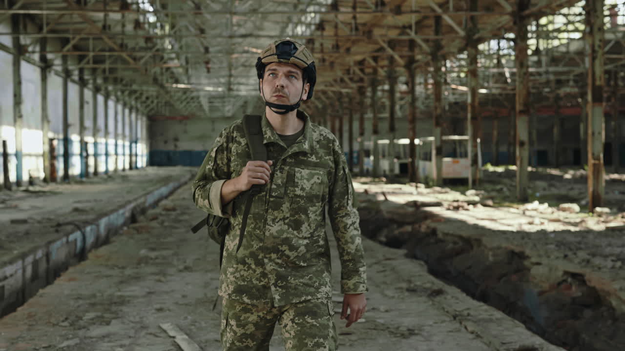 Soldier in a Destroyed Factory