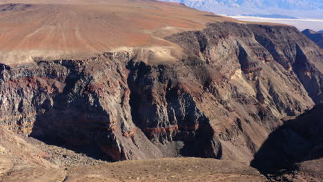 Aerial-view-from-right-to-left-of-colorful-star-wars-canyon-located-in-Claifornia,-USA-on-a-bright-sunny-day