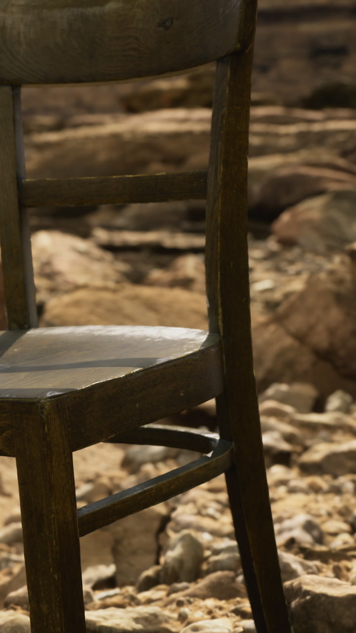 Rustic chair by the riverbank invites contemplation in natures embrace
