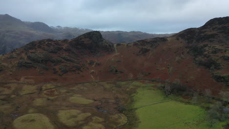 Drone-flight-from-120metres-flying-towards-the-Langdale-mountain-range-between-Side-Pike-and-Pike-O-Blisco