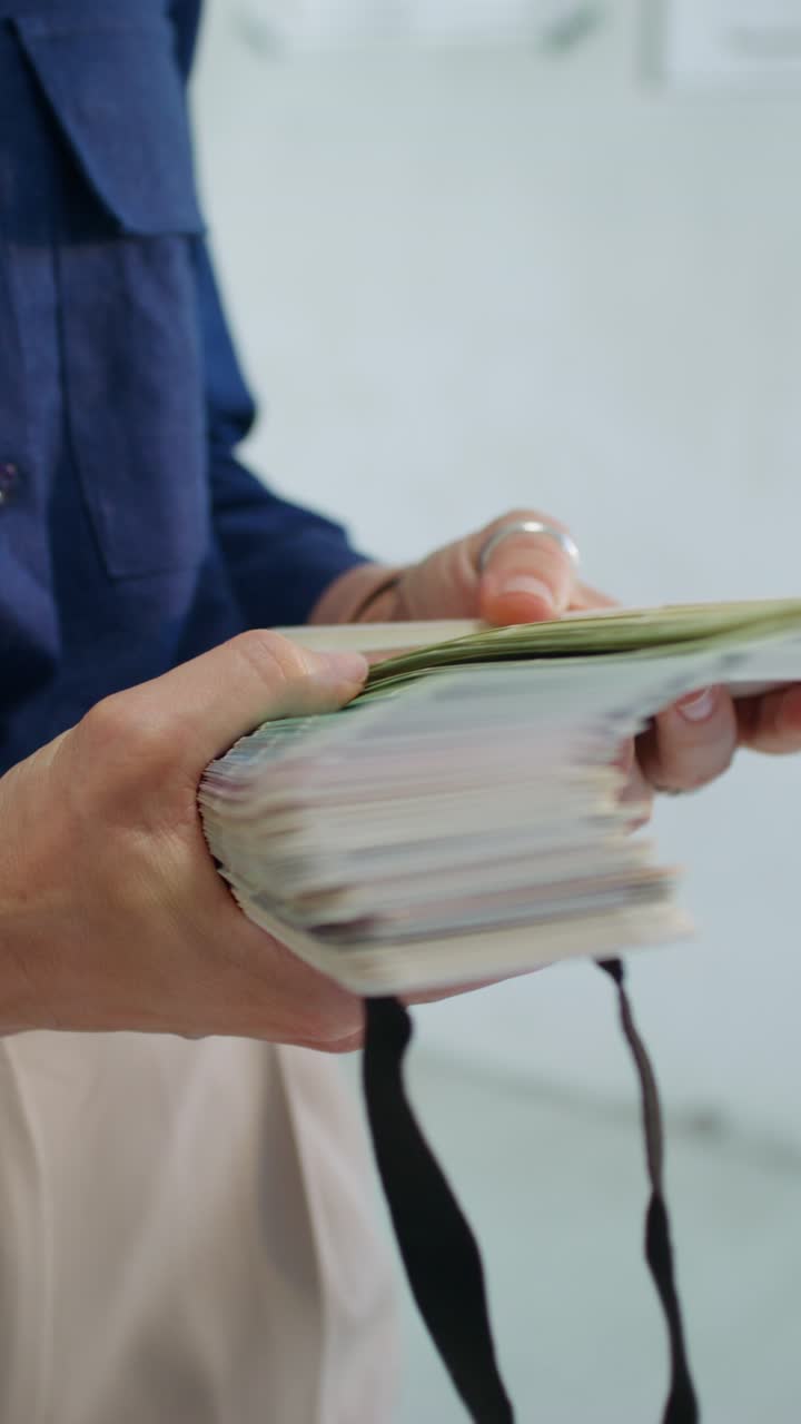 Person Selecting Paint Color Swatches