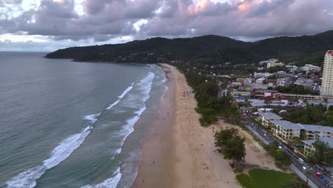 Bird's-eye-view-of-the-long-Karon-Beach-in-Phuket,-Thailand