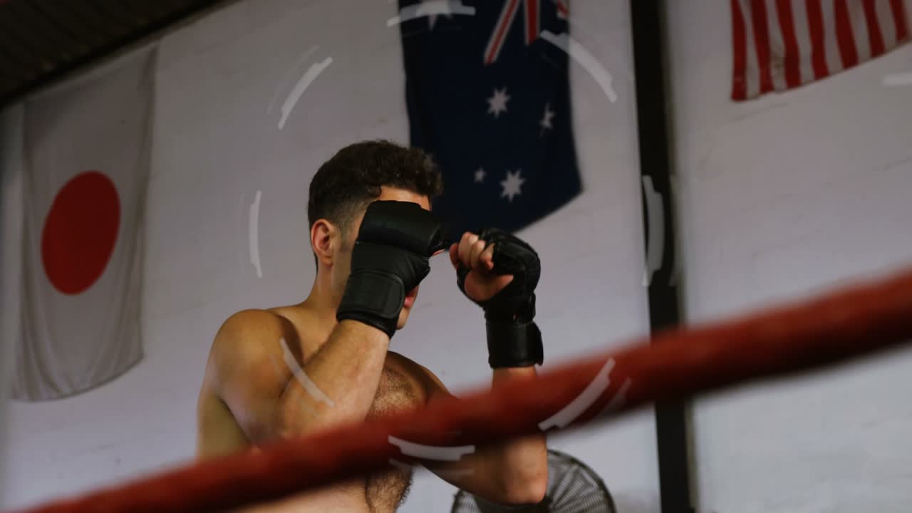 Male boxer shifting weight throwing jab and high kick for boxing drill HUD overlay tracking motion