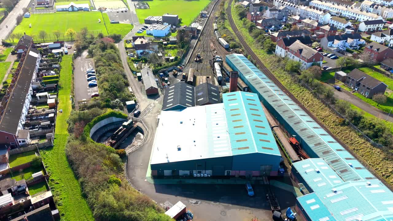 Clockwise overhead 4K 60FPS aerial video of Whitehead Railway Museum in Whitehead, County Antrim, Northern Ireland in the UK. Produced with Rec709 color