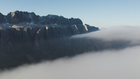majestic mountains rising above a sea of fog