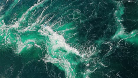 Blue-waves-of-water-of-the-river-and-the-sea-meet-each-other-during-high-tide-and-low-tide.