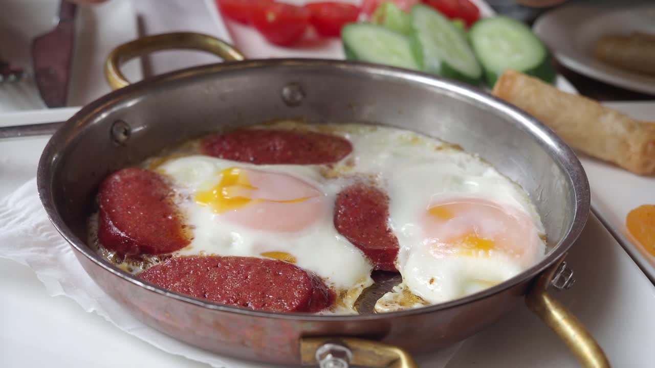 Woman having Turkish breakfast