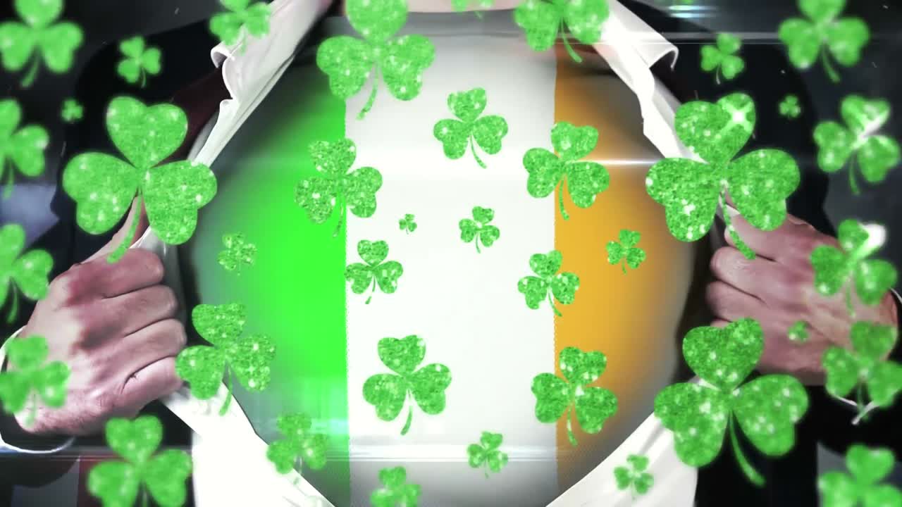 animación de tréboles verdes y hombre con bandera irlandesa en su camiseta en el fondo para el mundo st. patr