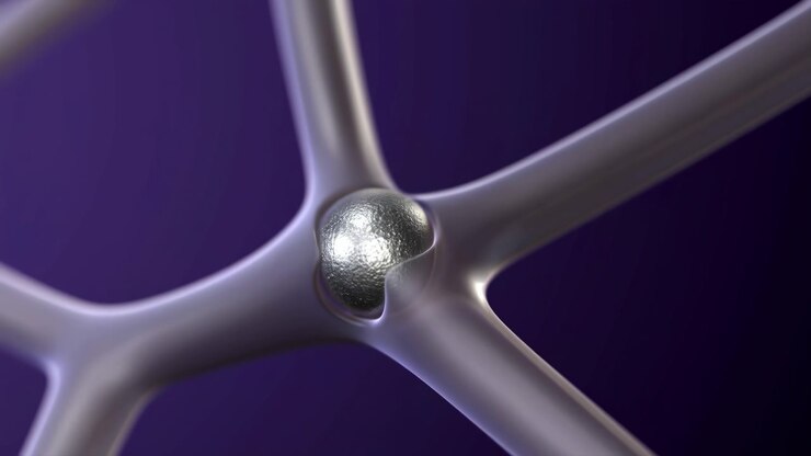 Close view follows a textured metallic droplet held within curved pale tubes as the branching structure shifts gently, revealing changing reflections and soft violet depth.
