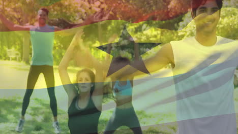 exercising in park, people with ghana flag animation in background