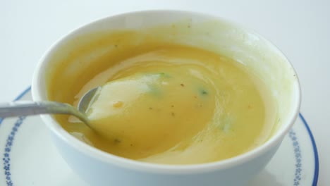 creamy soup in a white bowl