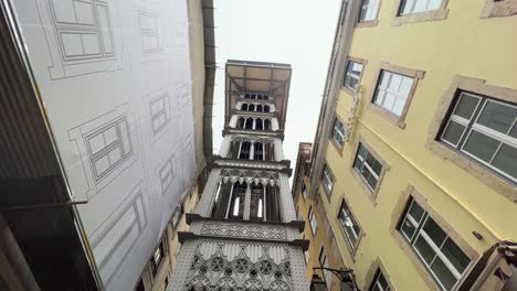 santa justa lift in lisbon, portugal filmed from below during the day