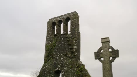 revers pullback between graveyard gaelic cross pattern on cemetery headstones