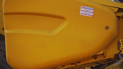 combine harvests wheat. close up view of modern combine harvester in action