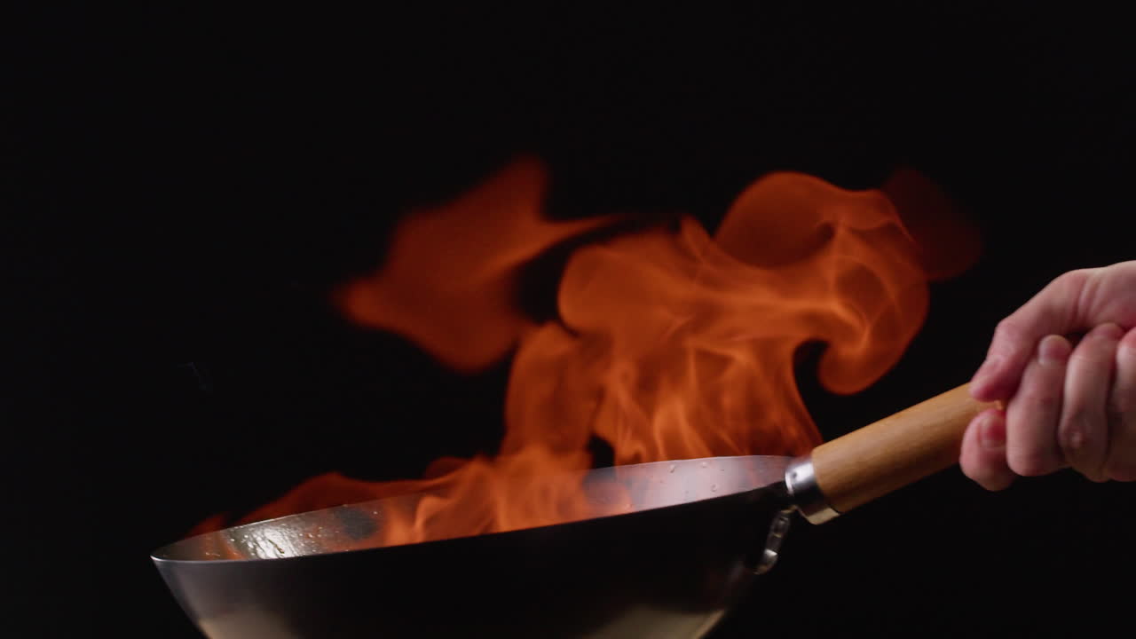 Wok Cooking with Fire