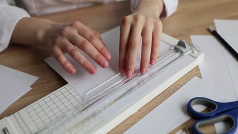 Cutting paper with a paper cutter