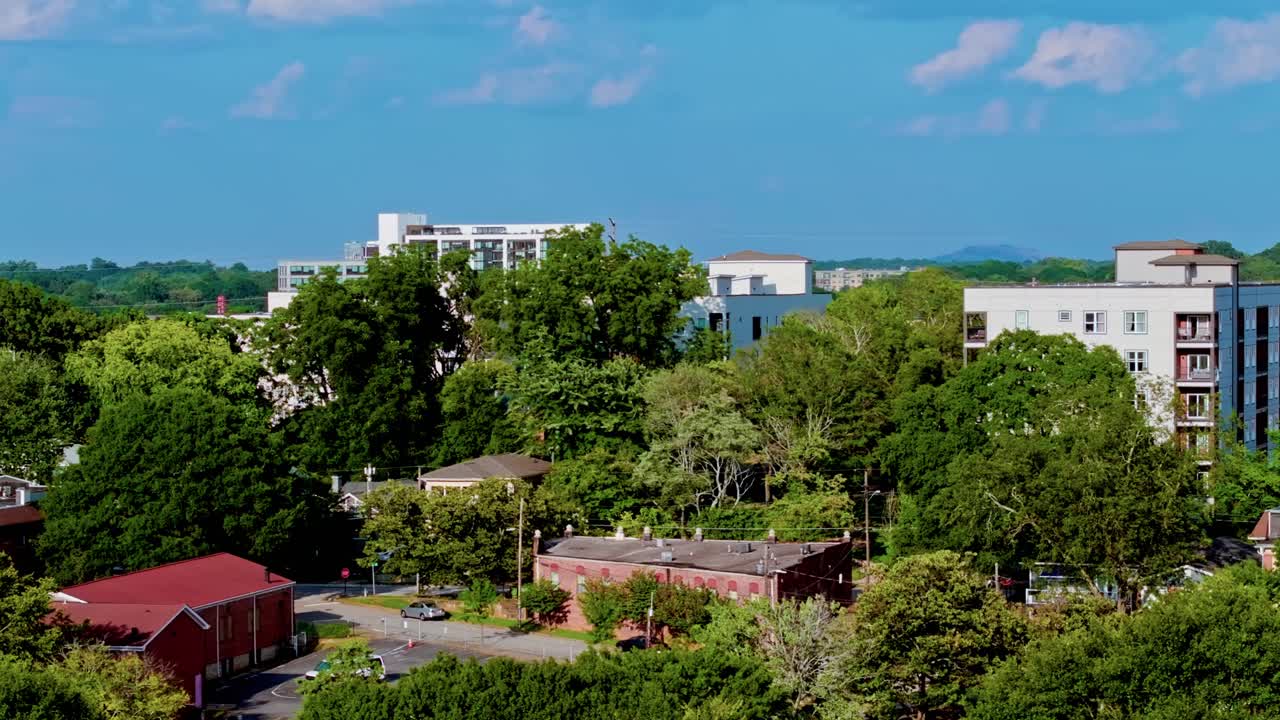 Atlanta city residential neighbourhood surrounded by green trees, garden, Georgia, Aerial