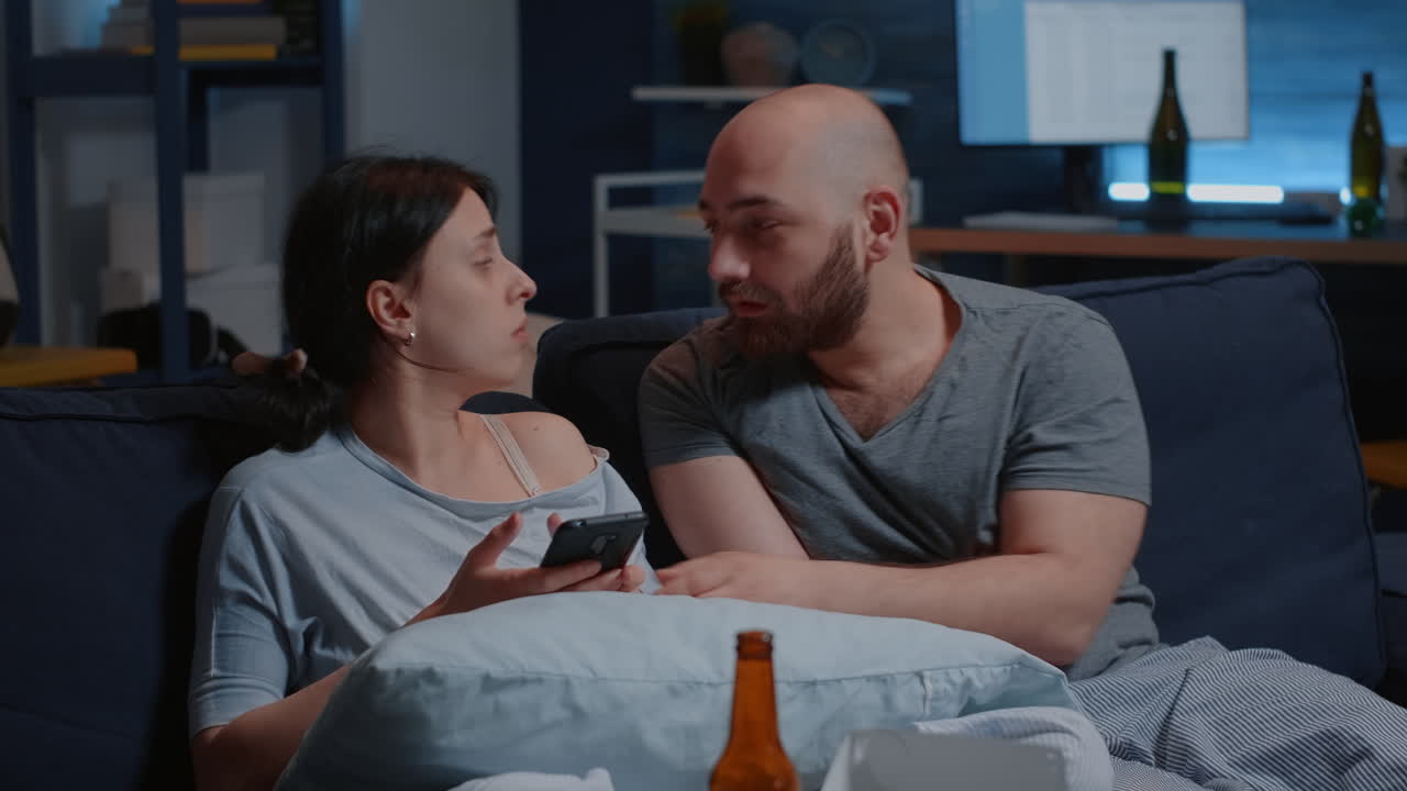 Shocked worried couple feeling stressed about eviction notice